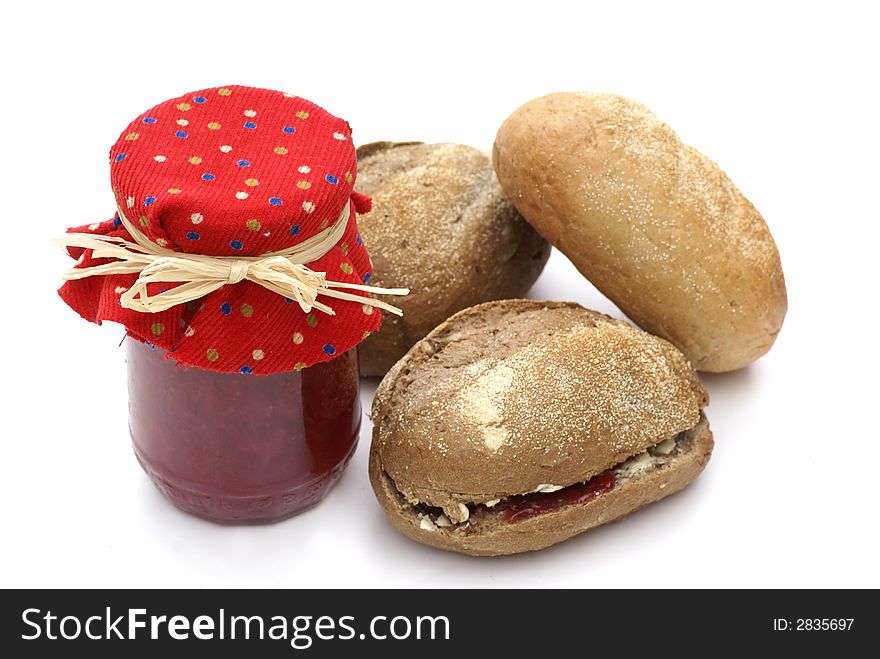 Jam with buns against white background. Jam with buns against white background.