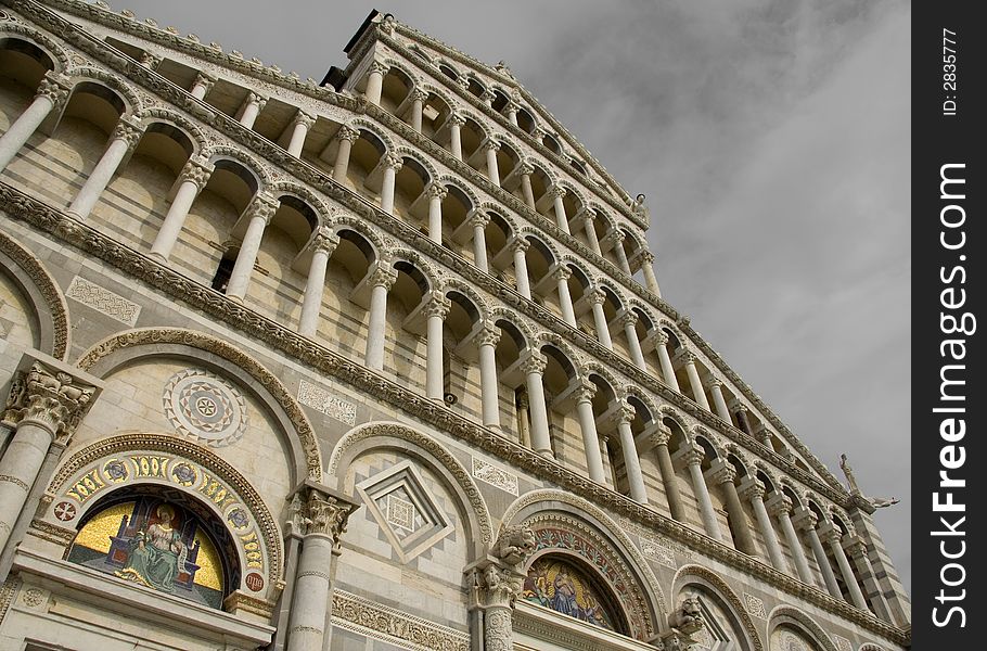 Facade of Pisa Cathedral, looking up towards the sky