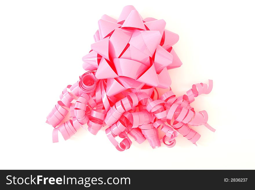 Pink bow with lots of ribbons for placing on gifts, boxes etc.