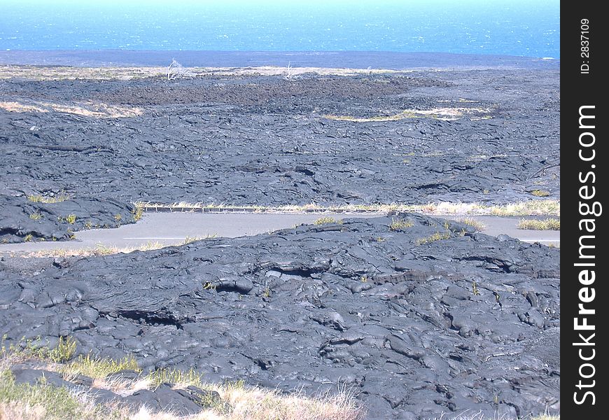 Lava Trail in the Kilauea Volcano located on the Big Island of Hawaii.  The volcano is still active.  This was the old Crater road, until it was covered by lava in the 1980's. Lava Trail in the Kilauea Volcano located on the Big Island of Hawaii.  The volcano is still active.  This was the old Crater road, until it was covered by lava in the 1980's.