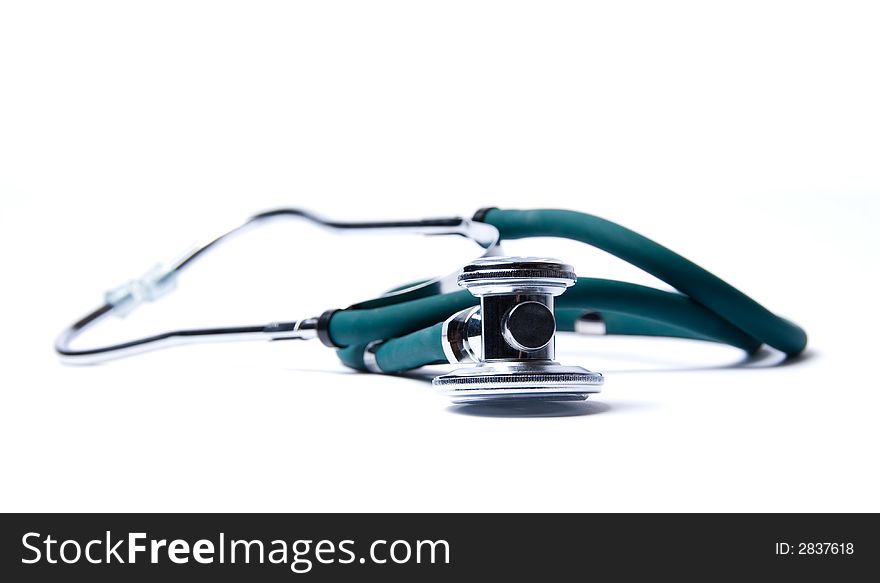 Stethoscope in green on an isolated white background