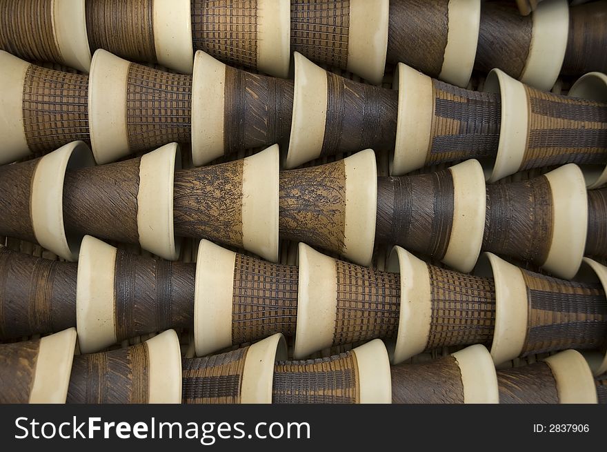 Set of handmade ceramic cups in set creating pattern