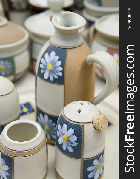 Ceramic handmade cups and jars on the countryside market