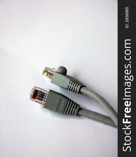 Broadband cable RJ-45 on white background. Broadband cable RJ-45 on white background