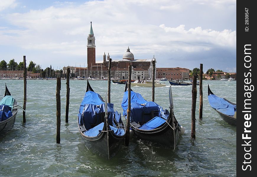 Gondolas in the water at Venice, Italy. Gondolas in the water at Venice, Italy