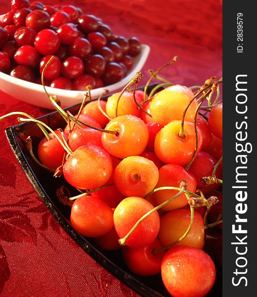 Fresh yellow and red cherry in bowl