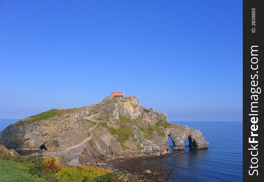 San Juan de Gaztelugatxe (Basque Coast, Spain). This little chapel is build on top of a small island connected to land only by a steep stone stairway with more than 200 steps. San Juan de Gaztelugatxe (Basque Coast, Spain). This little chapel is build on top of a small island connected to land only by a steep stone stairway with more than 200 steps