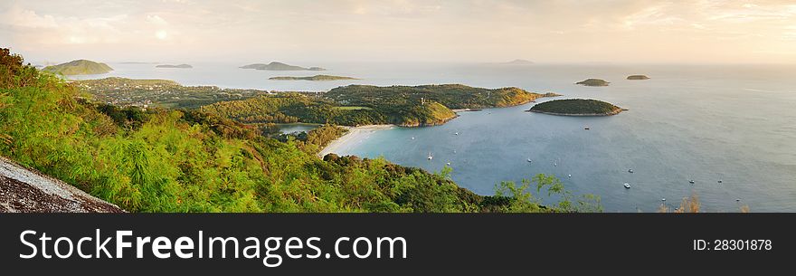 Cape is a mountain of rock that extends into the sea in Phuket, Thailand. Cape is a mountain of rock that extends into the sea in Phuket, Thailand