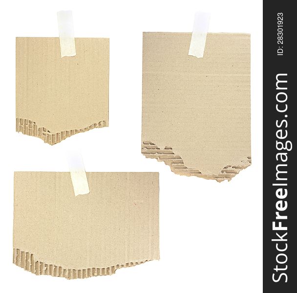 Cardboard pieces attached with a sticky tape on white background