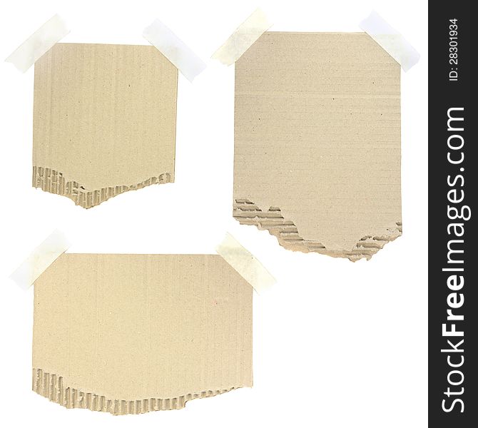 Cardboard pieces attached with a sticky tape on white background