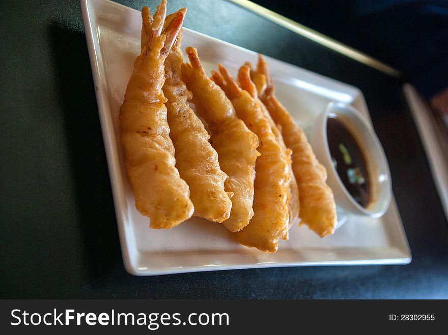 Deep fried popcorn shrimp platter in a taditional Chinese restaurant