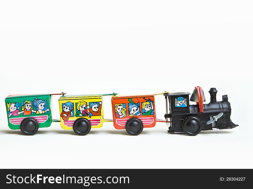 TOY TRAIN ON WHITE BACKGROUND