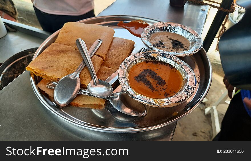 This is a closeup shot of one of the most famous Indian South Indian Foods Dosa and Chutney