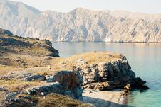 Free Aerial View Tourist Woman Explore Hike Walk In Oman Persian Gulf Mirellas Island On Sunrise. Musandam.Oman Royalty Free Stock Photo - 283020425