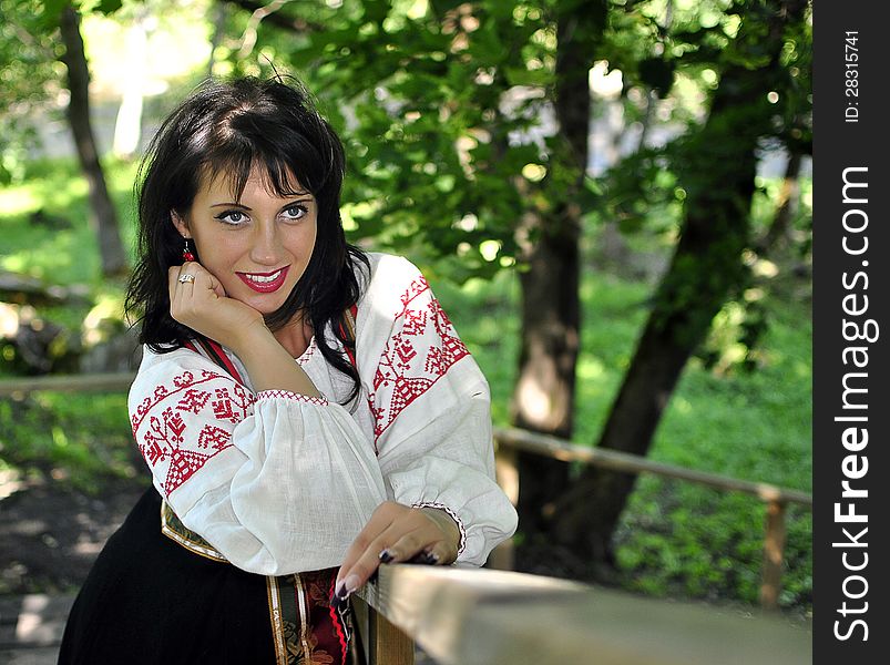 Portrait Of Pretty Woman In Russian Traditional Costume