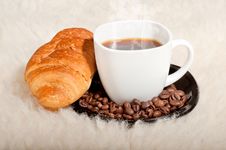 Croissant With Coffee And Beans On Fur Background Stock Photo Croissant With Coffee And Beans On Fur Background Stock Photo