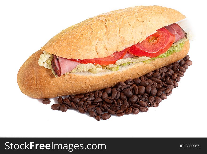 Sandwich with bacon and vegetables and coffee beans on white background.