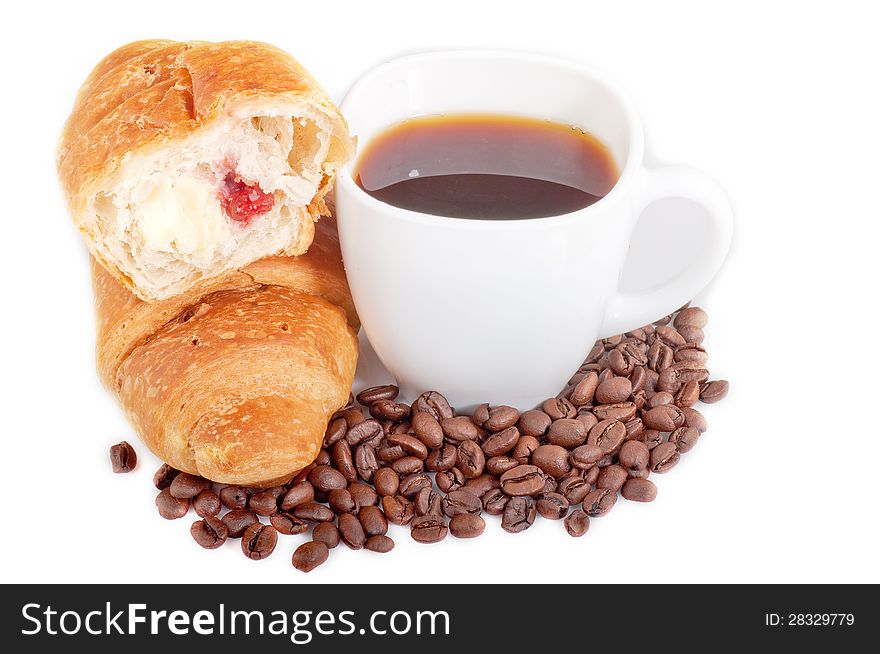 Croissant with coffee and beans on white background.