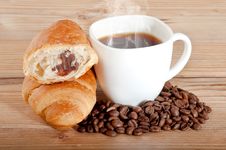 Croissant With Coffee And Beans On Wooden Background Stock Image Croissant With Coffee And Beans On Wooden Background Stock Image