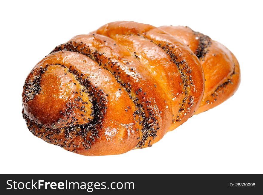 A sweet poppy seed bun isolated on a white background. A sweet poppy seed bun isolated on a white background