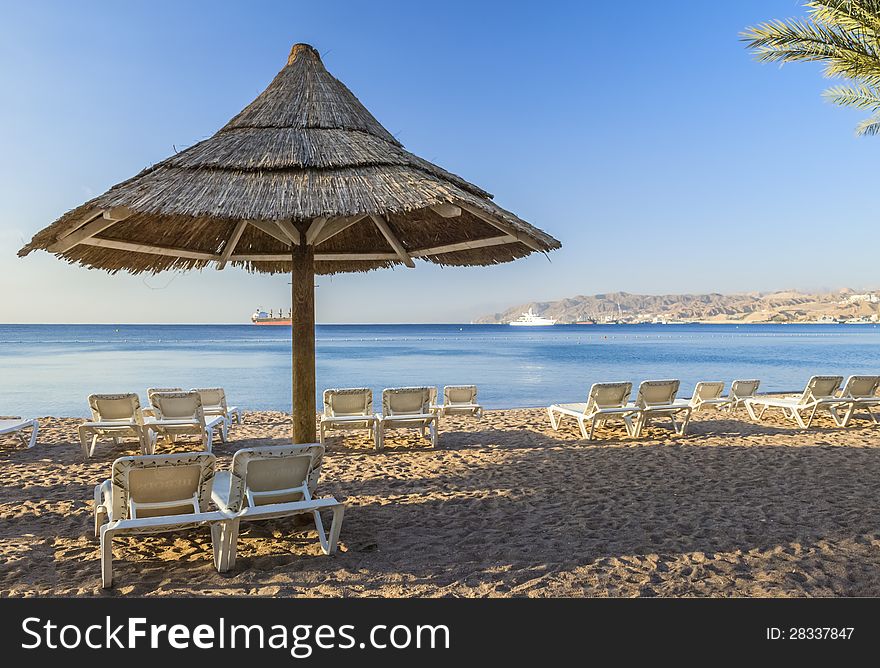 Sandy beach of Eilat - famous resort and recreation city of Israel. Sandy beach of Eilat - famous resort and recreation city of Israel