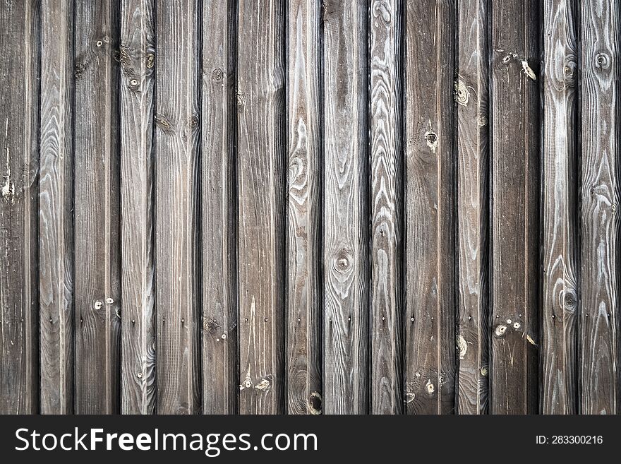 Vertical old wooden planks background.