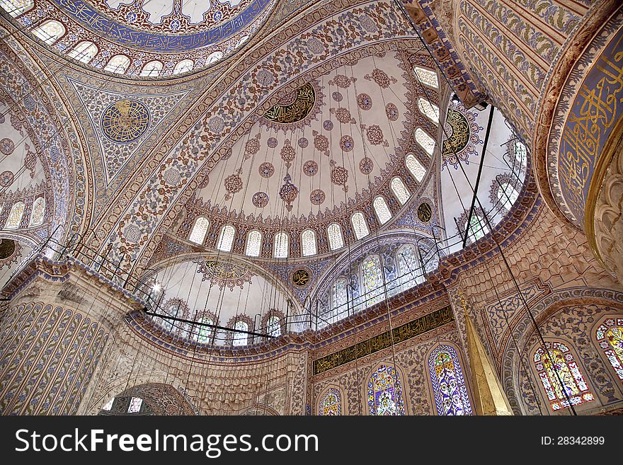 Sultanahmet Mosque (Ottoman Imperial mosque) interior ornate architecture in Istanbul, Turkey. Sultanahmet Mosque (Ottoman Imperial mosque) interior ornate architecture in Istanbul, Turkey