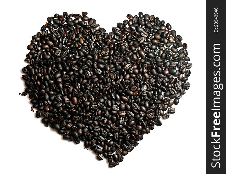 Coffee beans arranged in a heart shape. Coffee beans arranged in a heart shape.