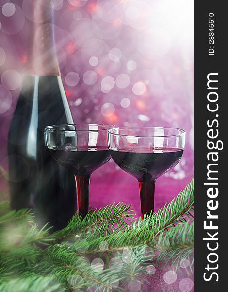 Christmas and New Year card with bokeh and glasses of champagne