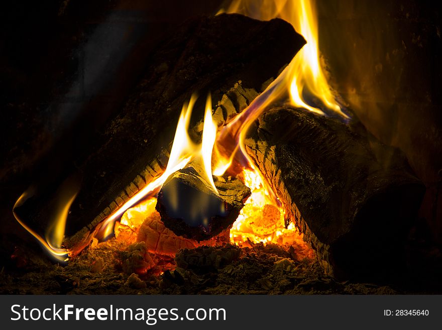 Fire and flames near the fireplace. Fire and flames near the fireplace.