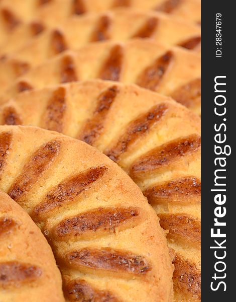 A close-up of sweet shortbread biscuits - vertical orientation. A close-up of sweet shortbread biscuits - vertical orientation
