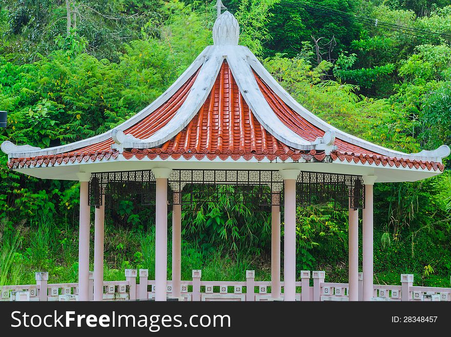 A pavilion in chinese style architecture with green environment. A pavilion in chinese style architecture with green environment