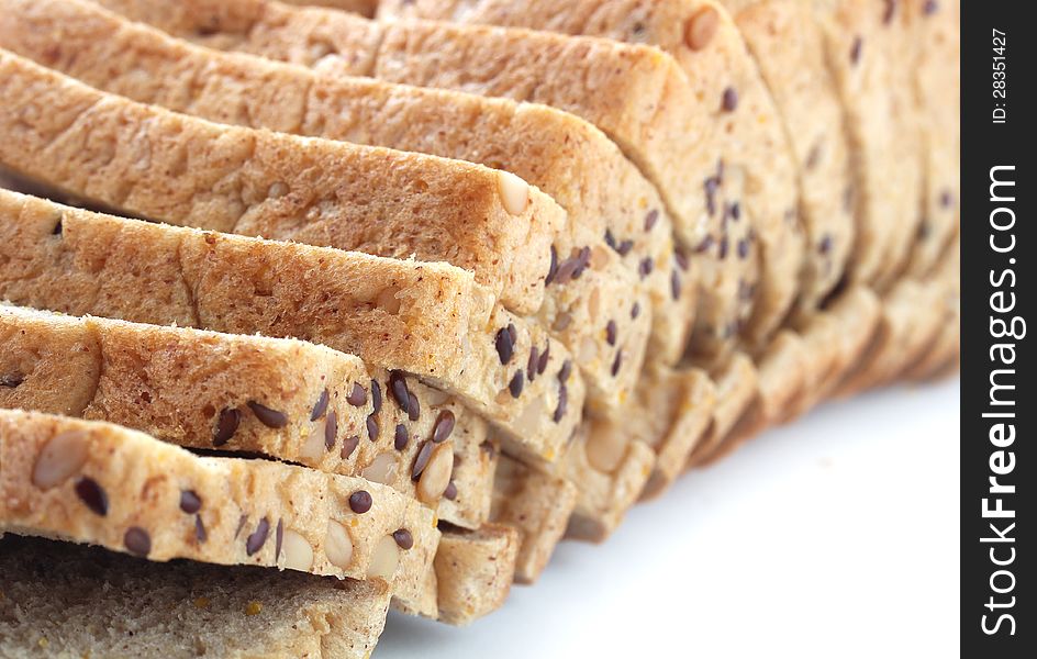 Closeup of multigrain bread slices with flaxseeds