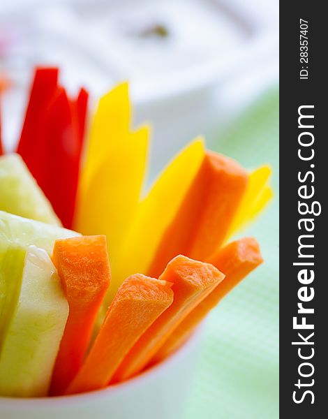 Macro of carrots, cucumber and pepper sticks