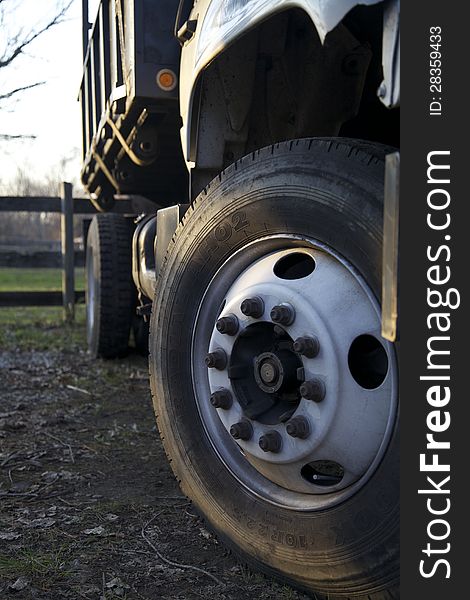 Wheel of a dump truck turning on the ground. Wheel of a dump truck turning on the ground