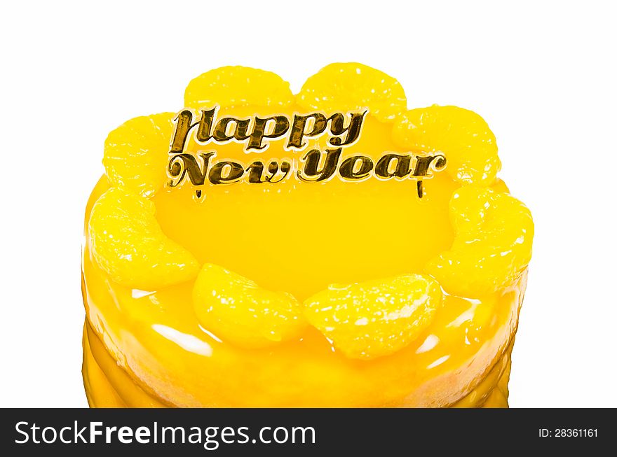 Orange cake with golden happy new year text isolated