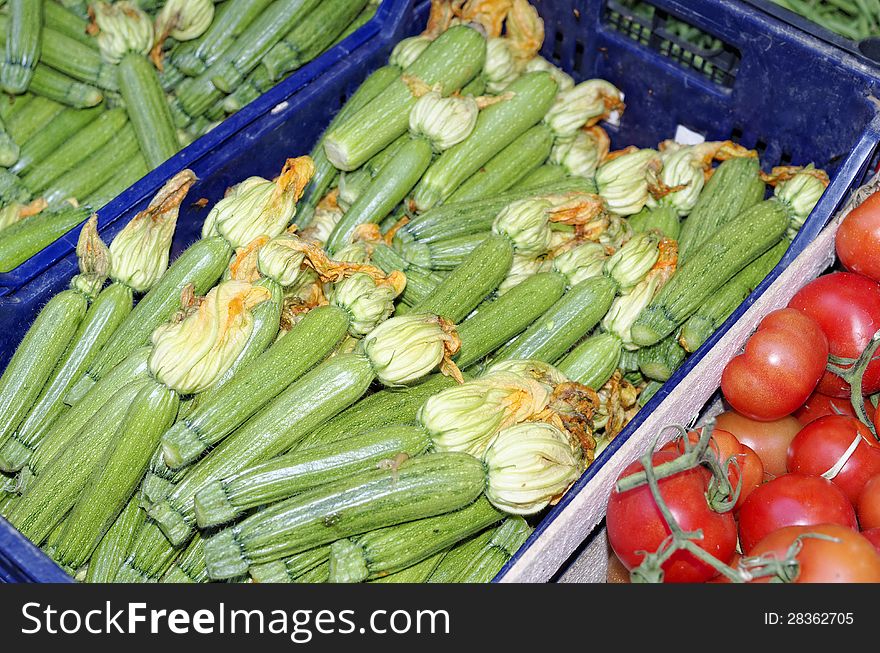 Some courgette with flowers at market. Some courgette with flowers at market