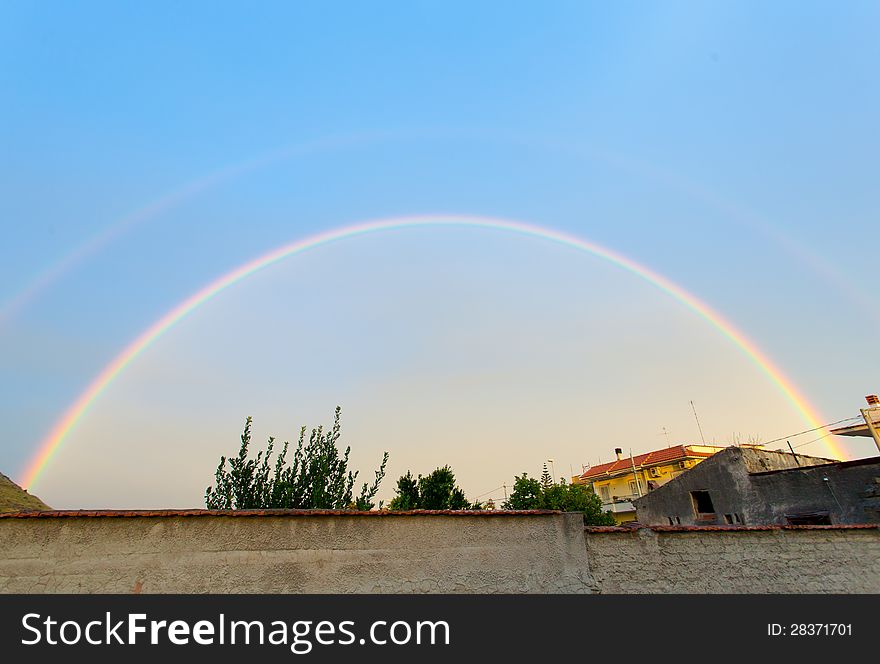 Full Rainbow coloreful in blue sky