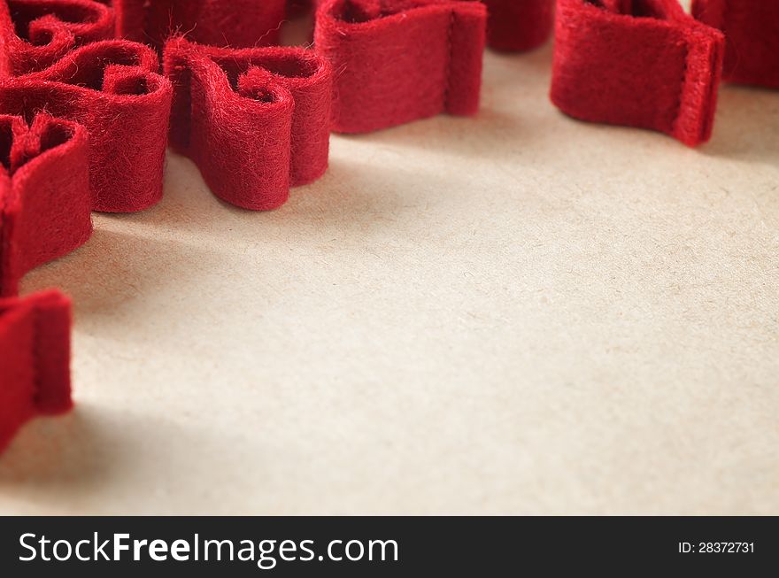 Valentine's day background with red hearts made of felt. Valentine's day background with red hearts made of felt