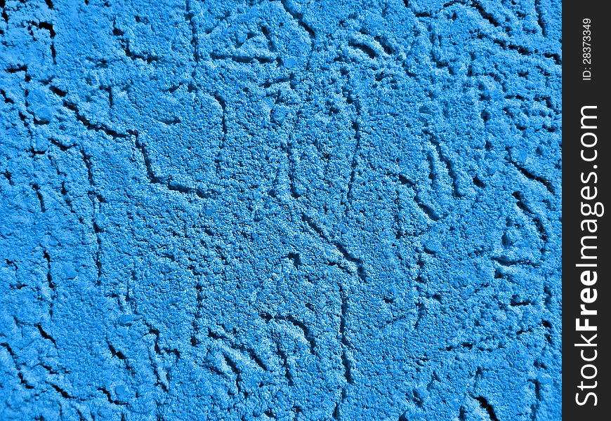 Blue surface of a wall with textured plaster. Blue surface of a wall with textured plaster