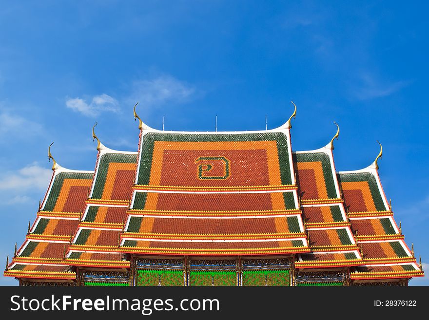 Thai temple roof with blue sky. Thai temple roof with blue sky