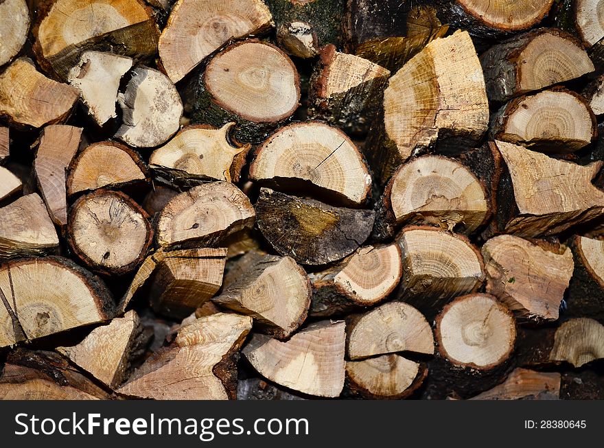 Wood chopped firewood fire lumber timber tree texture stack pile. Wood chopped firewood fire lumber timber tree texture stack pile