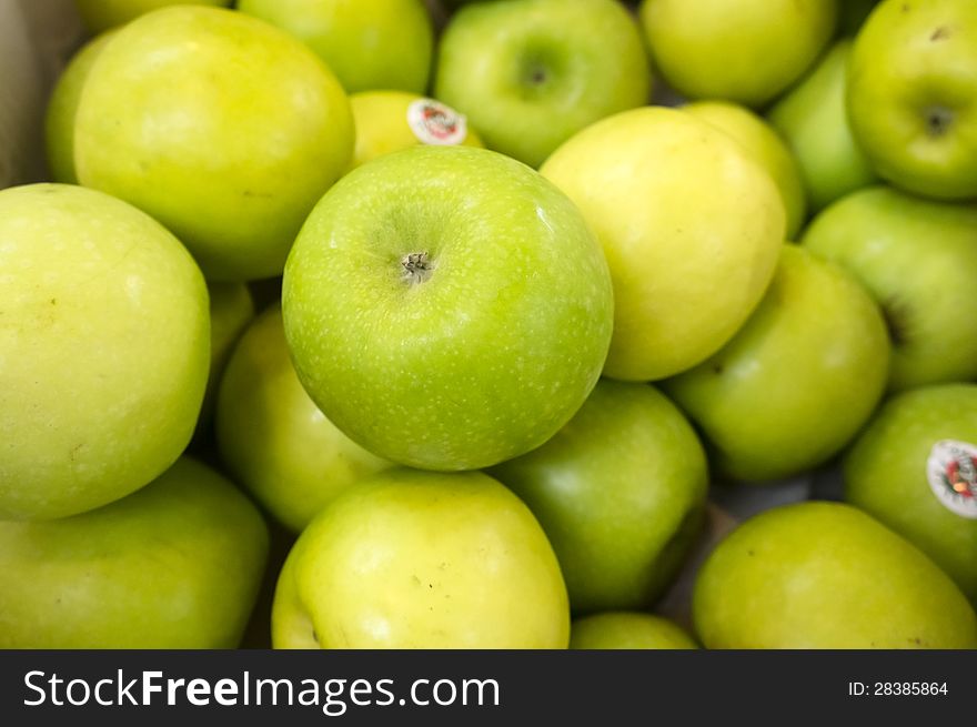 Close view of green apples at supermarket