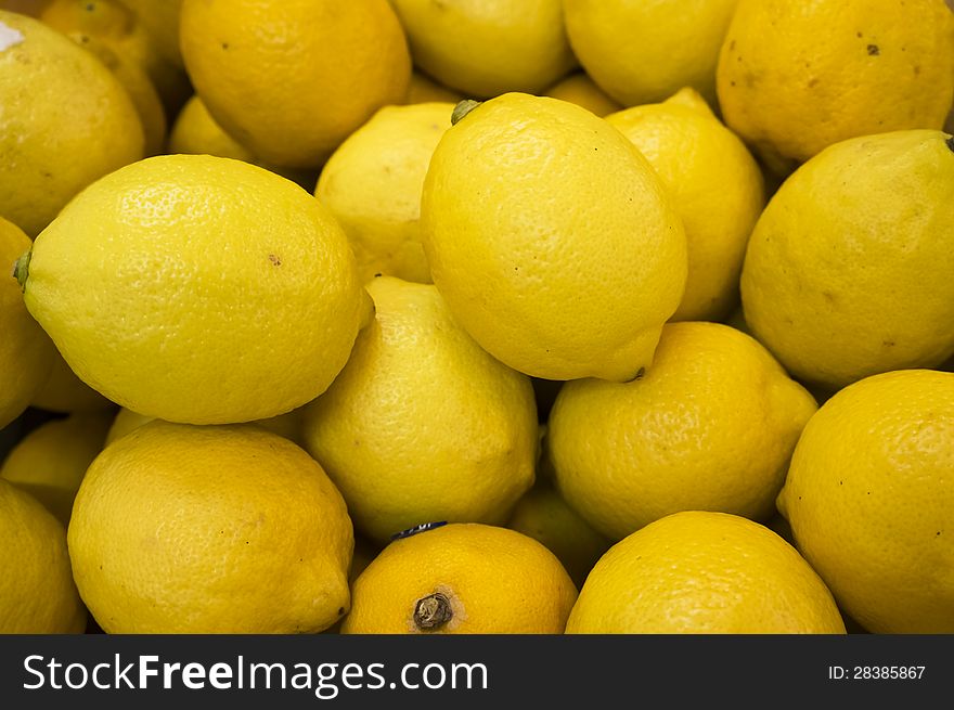 Close view of lemon fruit at the traditional market. Close view of lemon fruit at the traditional market
