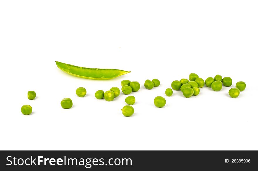 Scattered Green pea balls and null pod laying on white background. Scattered Green pea balls and null pod laying on white background.