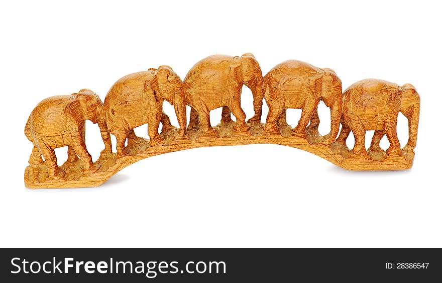 Five Wooden Elephants Walking Together Isolated