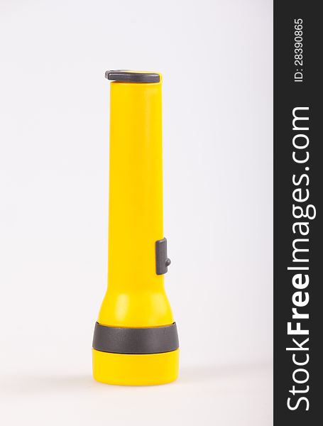 Yellow torch on white background