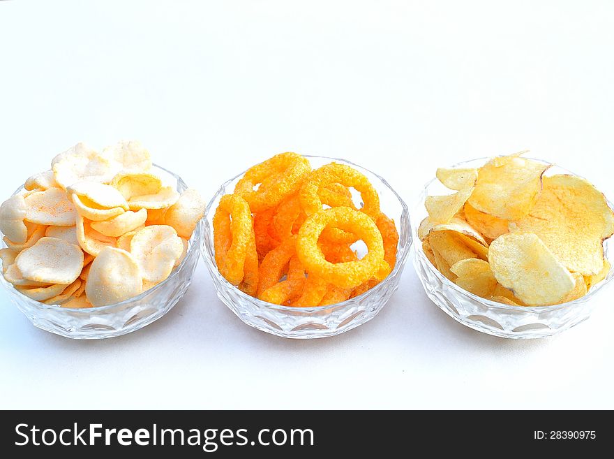 selection of nibbles on isolated white background