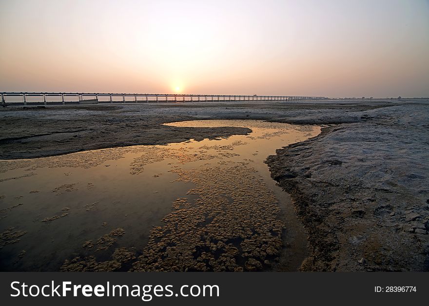 Sunset over the dry river bed of the Koshi river, Nepal