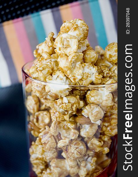 Clsoe up caramel popcorn in glass. Clsoe up caramel popcorn in glass